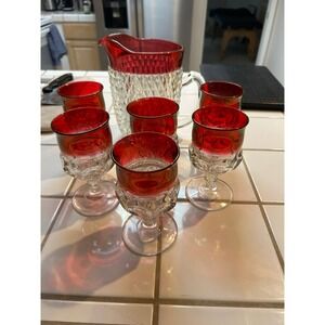 Mid Century Indiana Glass Cranberry Diamond Point Pitcher and Six Glasses